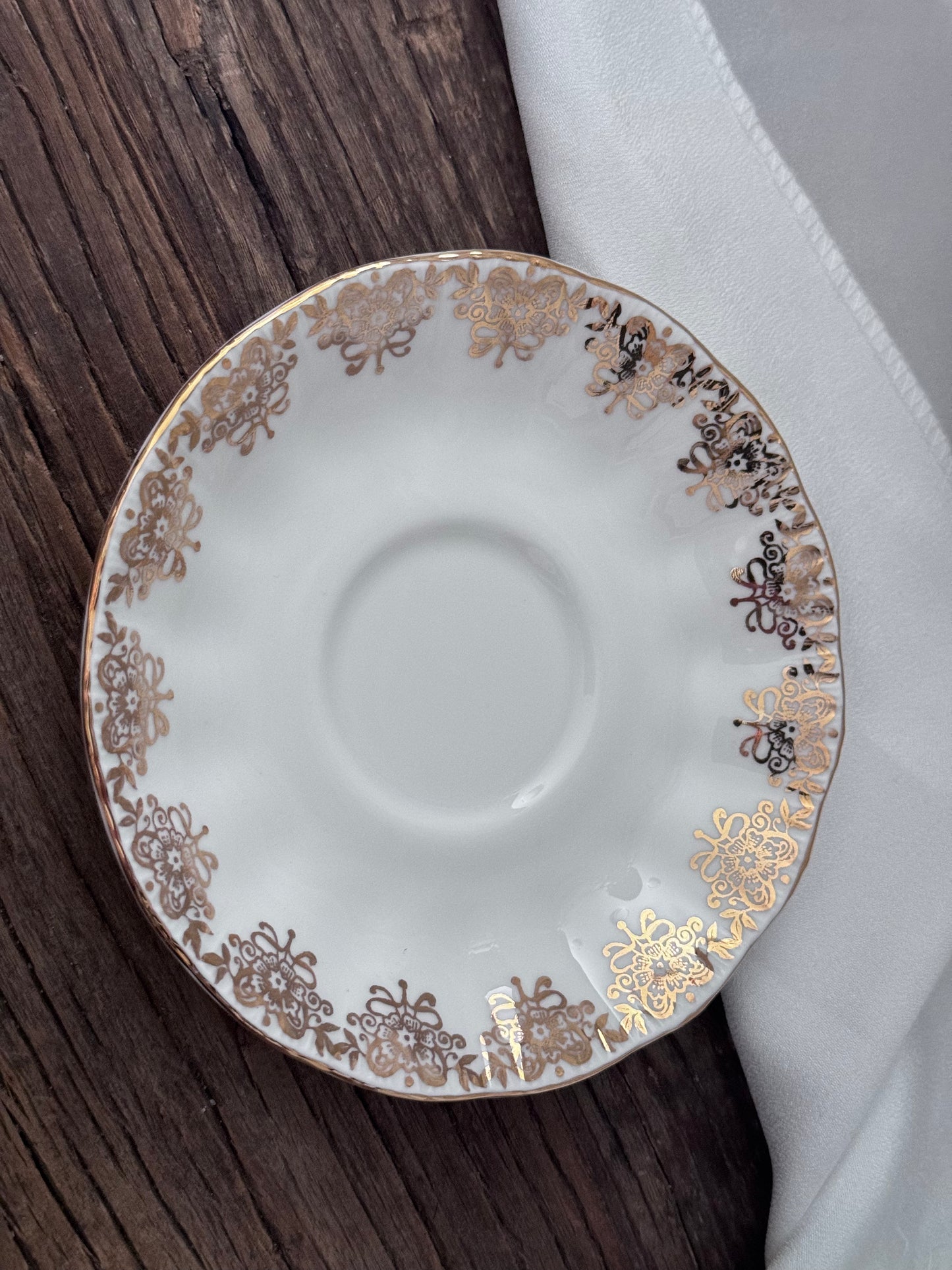 Paragon 'Joyeux Anniversaire' Golden Floral Pattern Teacup and Saucer