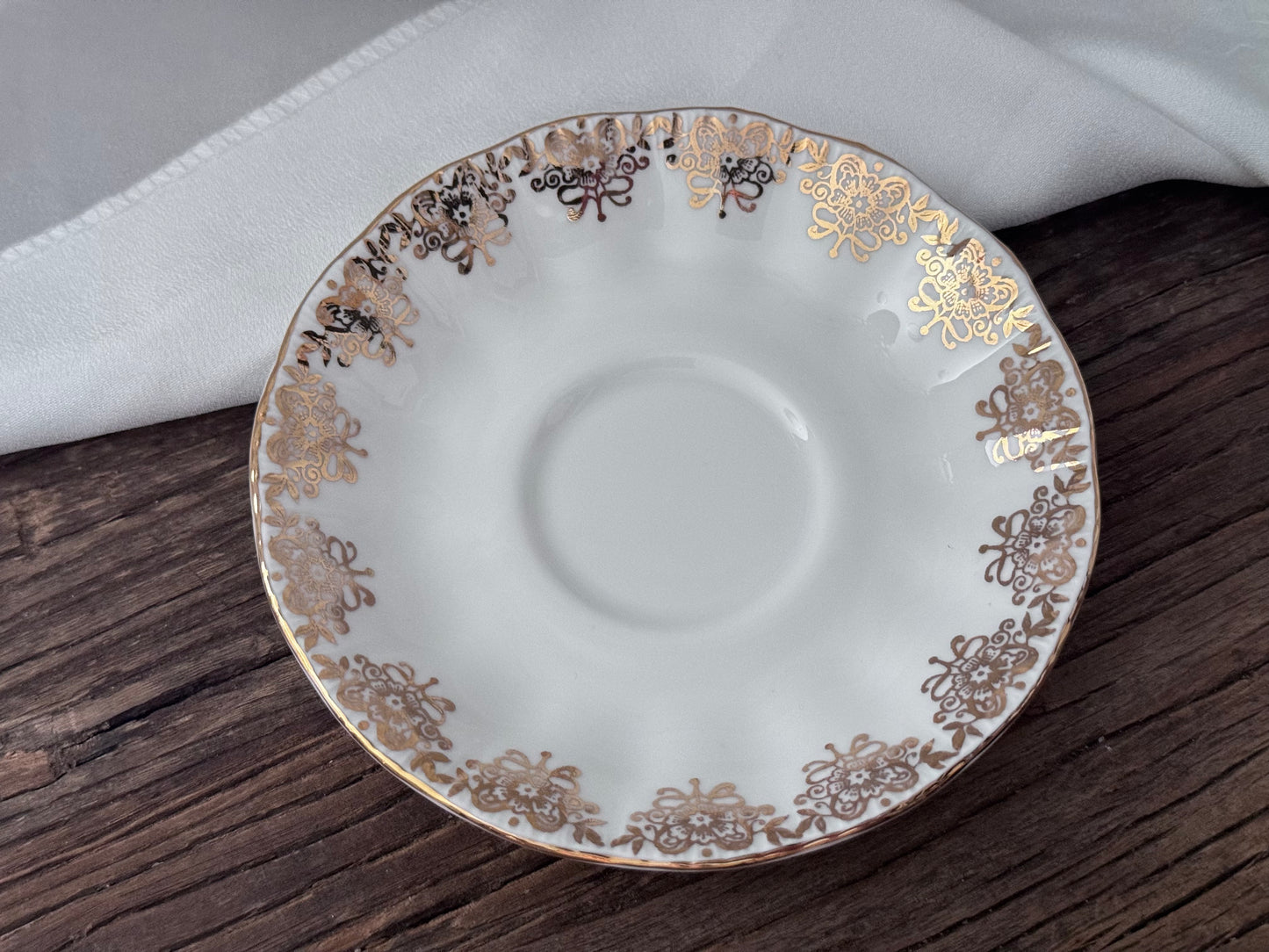 Paragon 'Joyeux Anniversaire' Golden Floral Pattern Teacup and Saucer