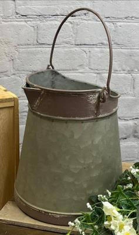 Rusty Metal Bucket With Spout