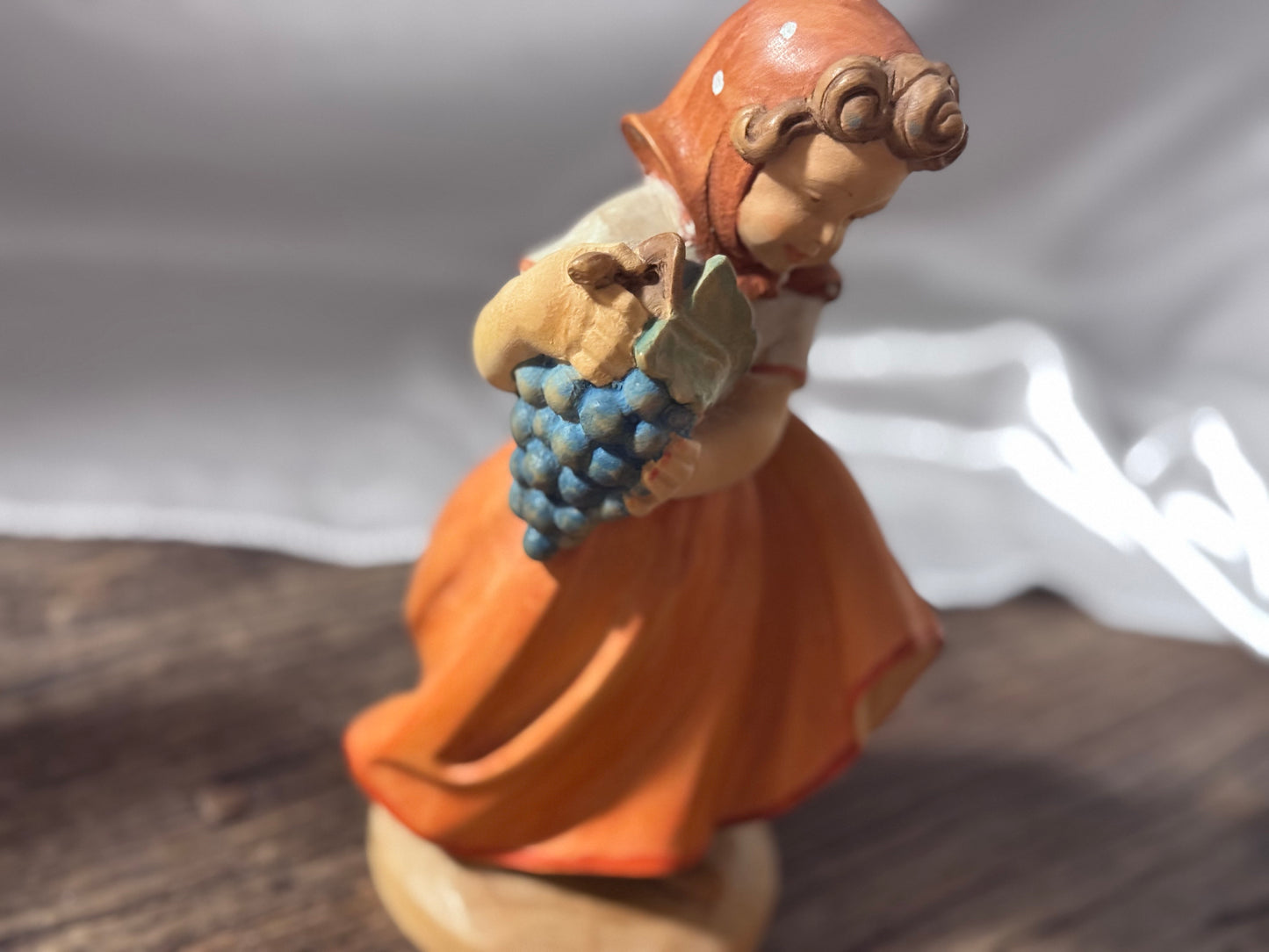 EHART Carved Wood Figurine of Girl with Grapes